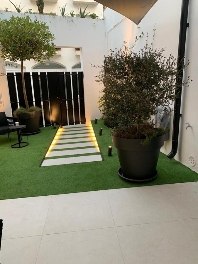 Aparthotel El Cargol L' Escala Exterior foto
