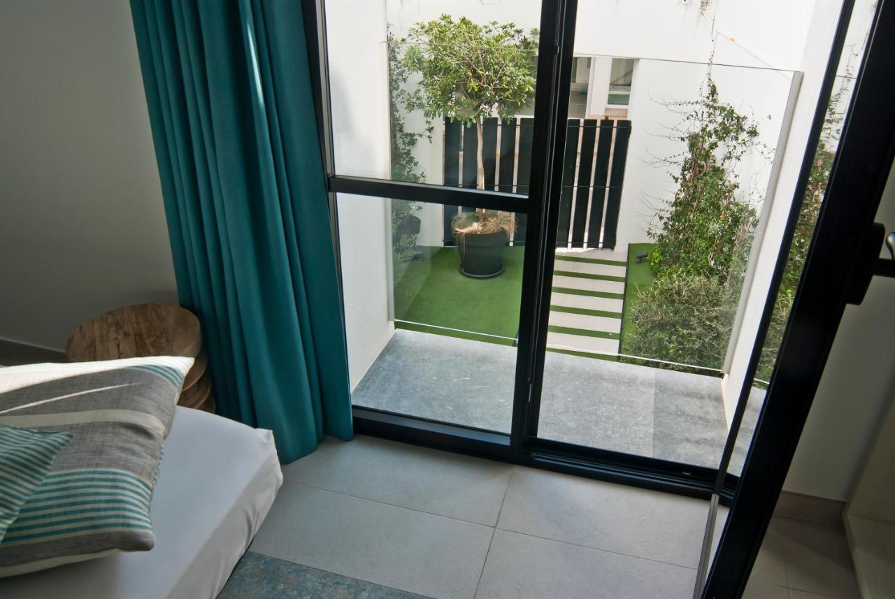 Aparthotel El Cargol L' Escala Exterior foto